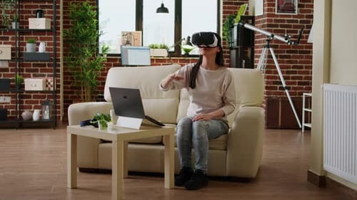 Woman Immersed in Virtual Reality at Home