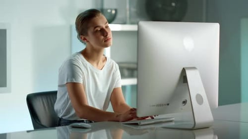 Successful Businesswoman Typing Desktop Computer Writing Emails at Home Office