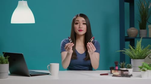 POV of Content Creator Doing Lipstick Review on Vlogging Camera