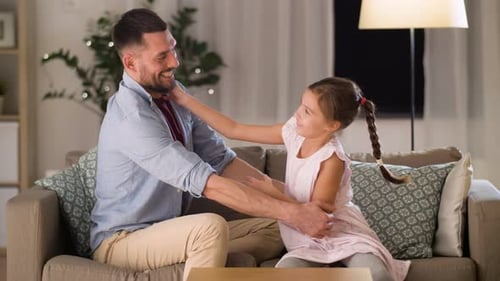 Dad and Daughter Share a Moment at Home
