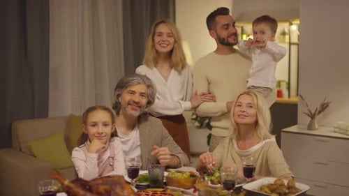 Happy Multigenerational Family Gathered for Celebration at Home