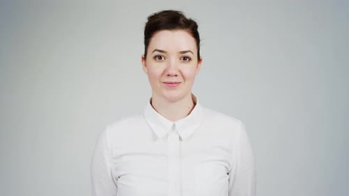 Smiling Woman in White Shirt Portrait