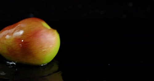 Single Ripe Pear Rotates Slowly on the Table.