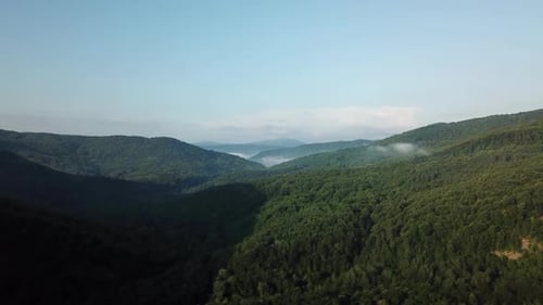 Aerial Landscape View of Caucasus Mountain at Sunny Morning with Fog.