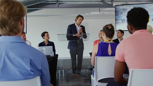 Corporate Speaker Addressing Audience at Conference