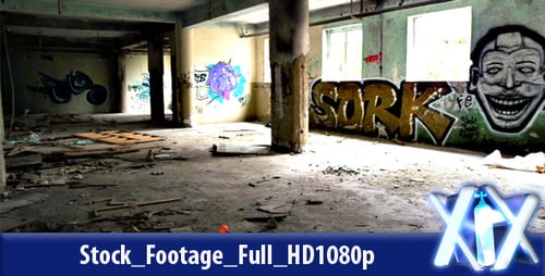 Derelict Building Interior with Graffiti and Debris