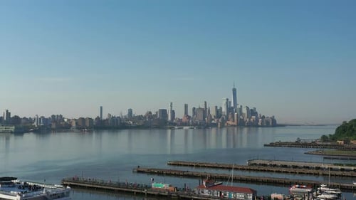 A drone view of the Hudson River from the NJ side early in the morning. The camera dolly out over th