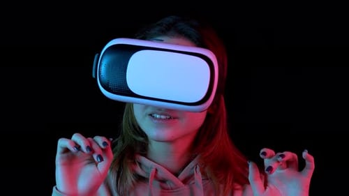 Woman Immersed in Virtual Reality with VR Headset