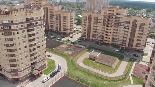 Beautiful Residential Buildings with a Playground in Yard
