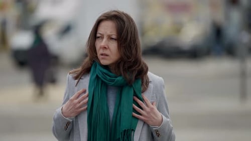 Woman Wearing Scarf Outside in the City