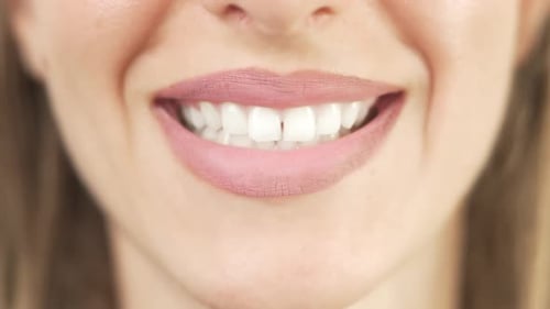 Close Up of Smiling Teeth Isolated