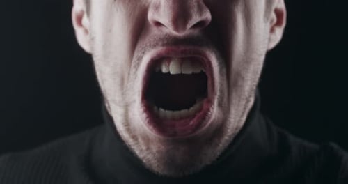 Close Up Mouth of Angry Man Screaming
