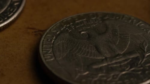 Rotierende Stock-Bildmaterial von amerikanischen Vierteln (Münze - 0,25$) - GELD 0223