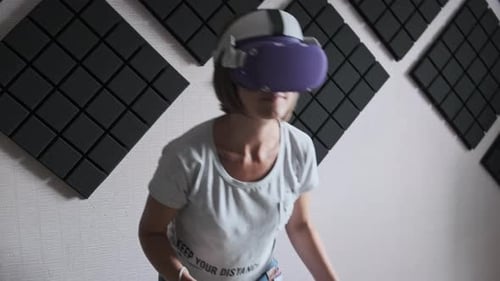 Woman Immersed in VR with Headset and Controller