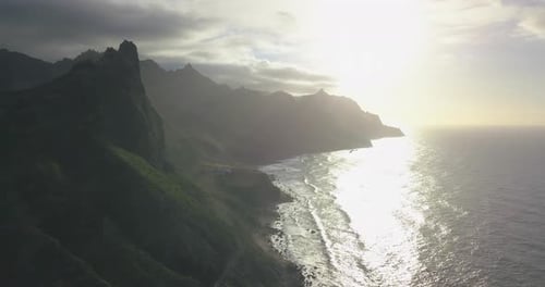 Aerial drone view of the coast coastline ocean sea at sunset in Tenerife, Spain.