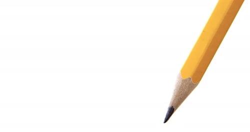 Close Up Shot of Yellow Pencil on White
