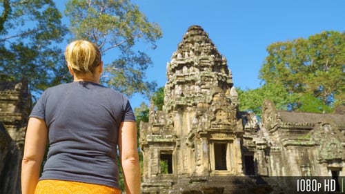 Following Back of Woman Walking to Thommanon Temple in Siem Reap, Cambodia