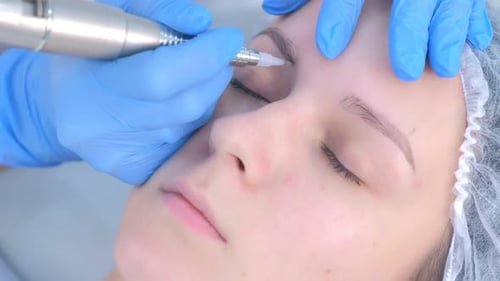Cosmetic Tattoo on Eyebrow in Beauty Clinic