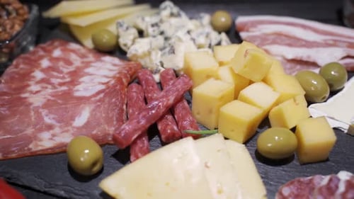 Platter with Spanish Ham Jamon Serrano or Italian Prosciutto Crudo, Sliced Italian Hard Cheese