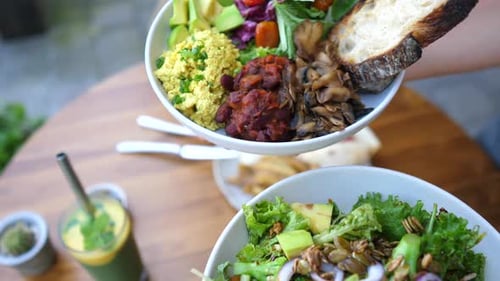 Bowl of Fresh Colorful Salad on Wooden Table