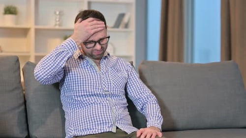 Worried Young Man Feeling Frustrated at Home