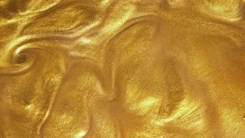 Shimmering Gold Liquid Rippling and Flowing