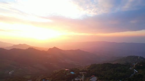 4K Aerial view over the mountains at sunset. Drone Flight Footage