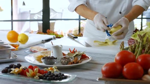 Man's Hands Peel Pear.