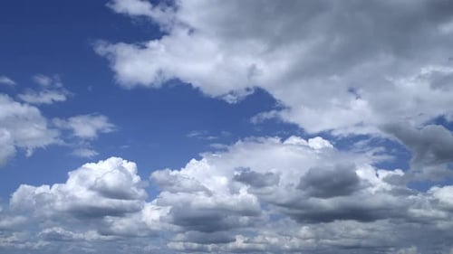 Fluffy cloud time lapse on a cloudy day 4k footage.