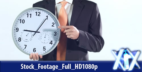 Man Points to Clock Emphasizing Time