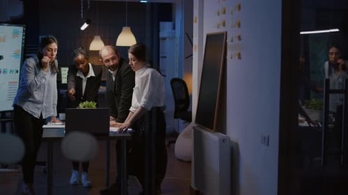 Office Team Works Late at Night