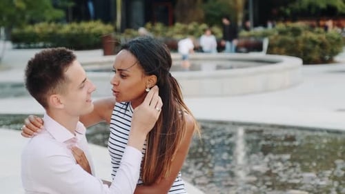 Close-up of Happy Mixed-race Couple in Love Having Date One Summer Day Outdoors