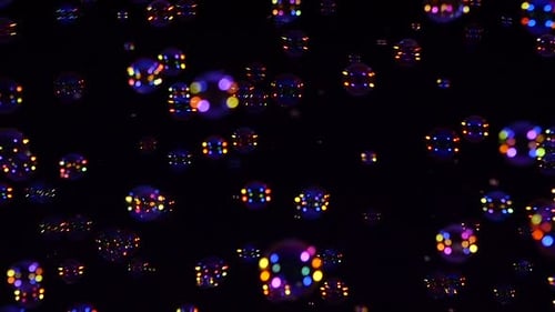 Blue and Orange Soap Bubbles on Black, Background, Slow Motion