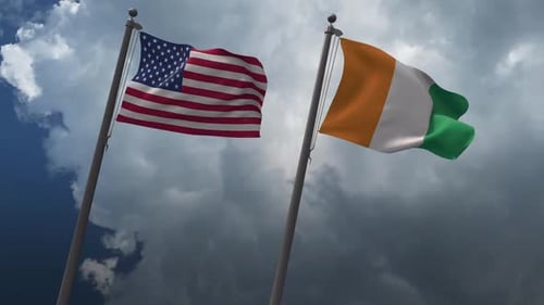 United States and Côte d'Ivoire Flags Waving in Wind