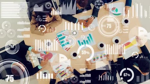 Team Analyzes Data with Graphics in Office Meeting
