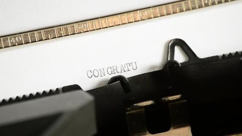 Writing Congratulations on Typewriter for Birthday