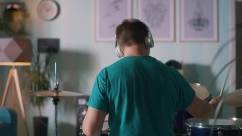 Anonymous Musician Playing Drums at Home