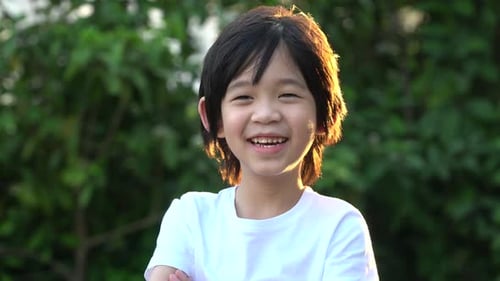 Happy Asian Child Smiling Outdoor