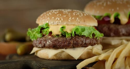 Delicious Burger with French Fries Close Up