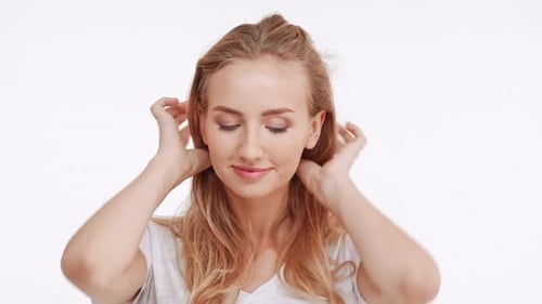 Woman with Blonde Hair Posing and Smiling