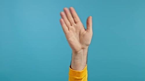 Arm and Hand Waving Hello on Blue Background