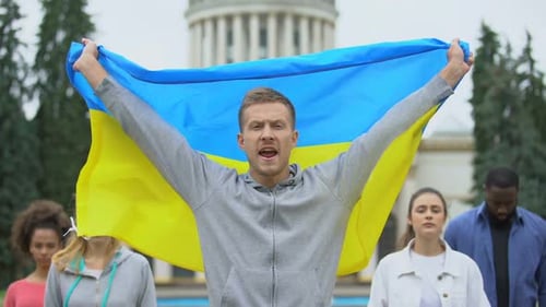 Group Raises Flag in Support of Community