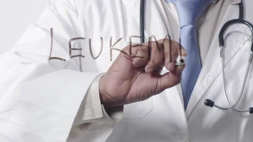 Doctor Writing Leukemia on Clear Surface, Close Up