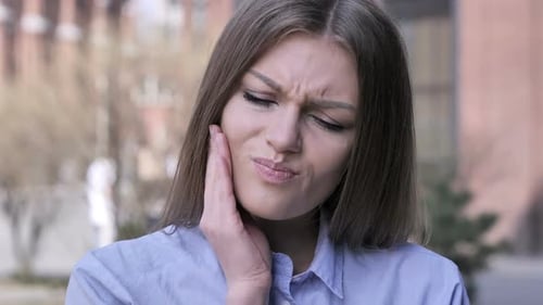 Toothache Young Woman with Tooth Infection