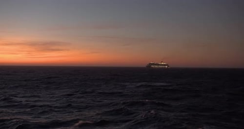 Luxury Cruise Ship on the Pink Sunset Light