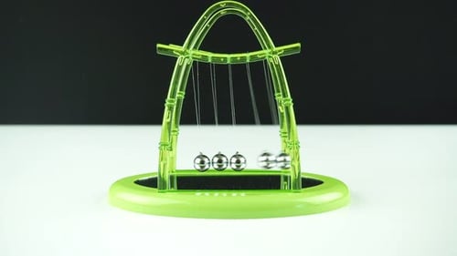 Green Pendulum Balls Newton On White Black Background 3.