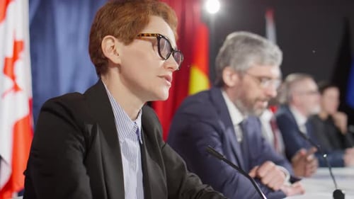 Panel of Speakers at a Corporate Press Conference