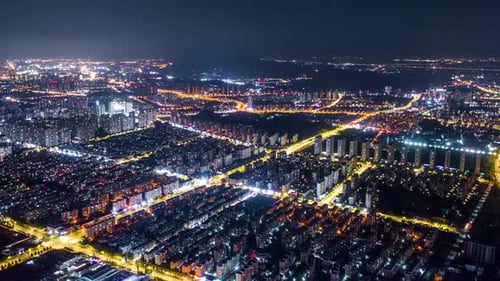 Aerial top view of city at night,timelapse