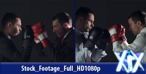 Two Businessmen Boxing in Studio