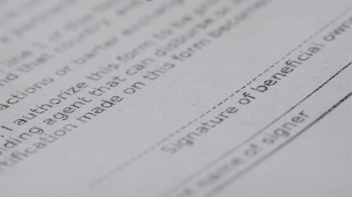 Signature on Contract By Pen in Hand